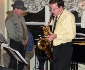 John Clark on bari sax, reading from chart