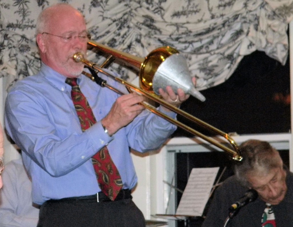 Tom Boates on trombone with funnel mute