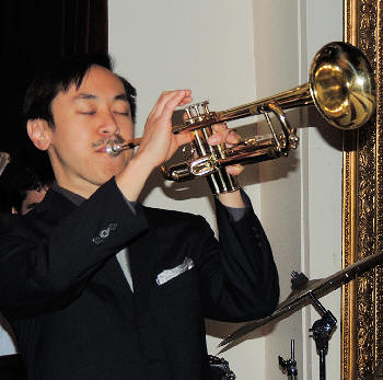 Gordon Au playing trumpet