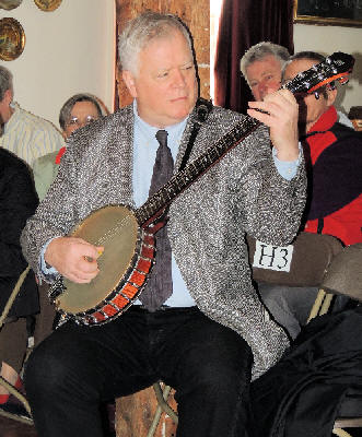 John Gill playing banjo