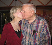 Bob and Marjorie kissing