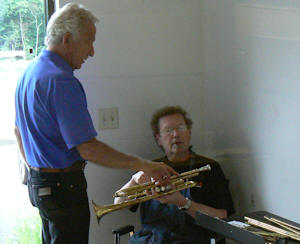 Doc and Scott examine trumpet