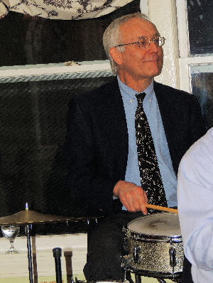 Bragdon with sticks on snare drum