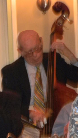 Al Ehrenfried on string bass, taped fingers flashing