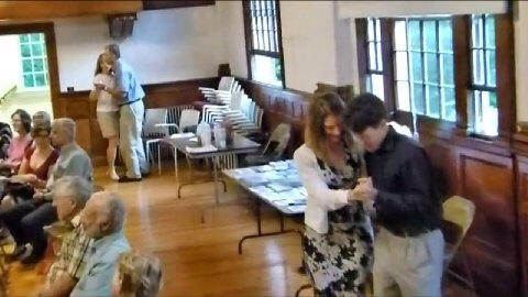 two young couples dancing in the back of the hall