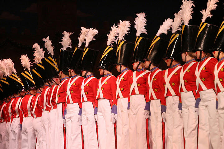 20 fantastic precision dancers dressed like Christmas Toy Soldiers on parade