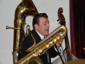 Vince surrounded by his instruments, singing his heart out