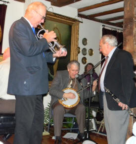 Lew green comping on muted trumpet, Jimmy singing, Noel looking on