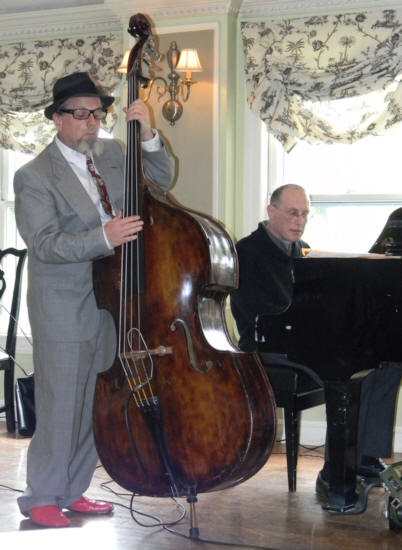 Ken slapping bass and Charles on piano