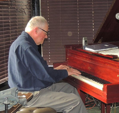 Frank on upright piano